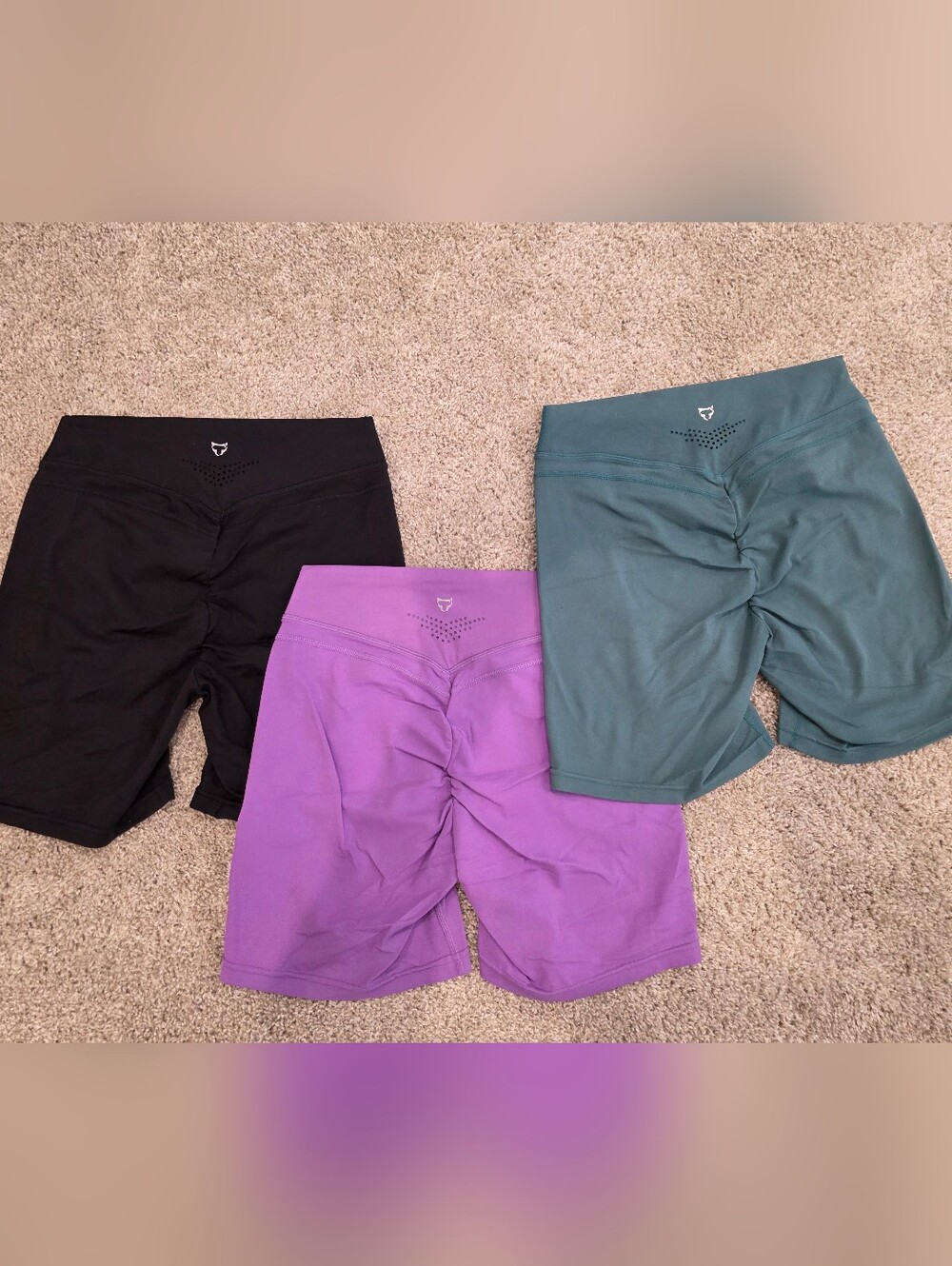 3 TomTiger high-waisted biker shorts featuring a scrunch butt design